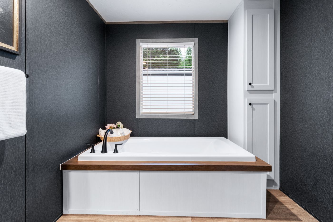 The EL SUENO BREEZE Primary Bathroom. This Manufactured Mobile Home features 4 bedrooms and 2 baths.