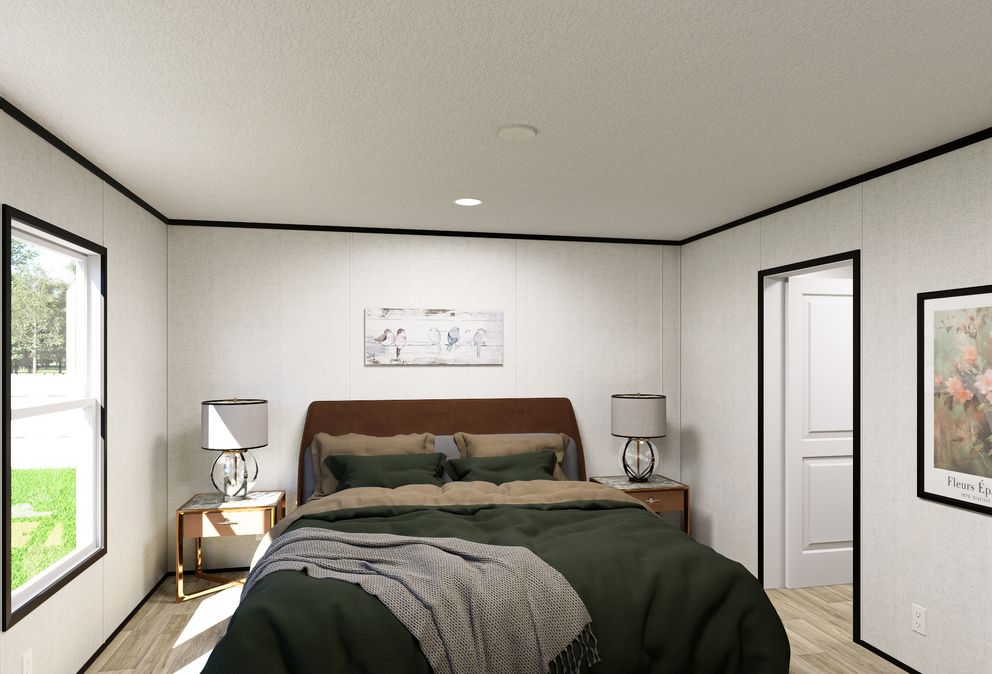 The ECLIPSE Primary Bedroom. This Manufactured Mobile Home features 4 bedrooms and 2 baths.