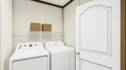 The COLOSSAL Utility Room. This Manufactured Mobile Home features 3 bedrooms and 2 baths.