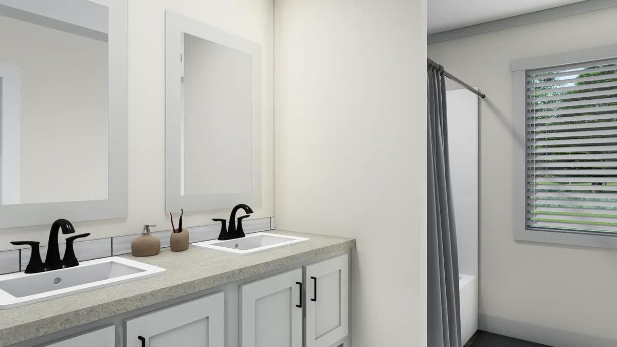 The FARM 3 FLEX ELITE DEN Guest Bathroom. This Manufactured Mobile Home features 3 bedrooms and 2 baths.