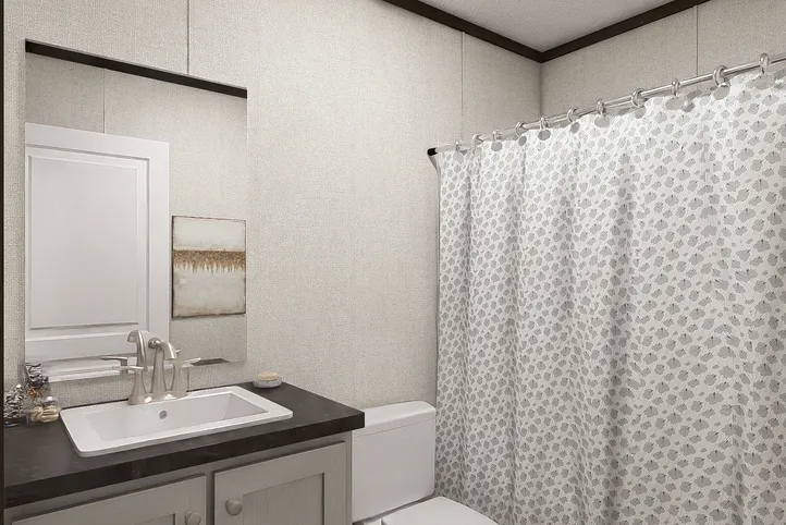 The DESIRE Guest Bathroom. This Manufactured Mobile Home features 3 bedrooms and 2 baths.