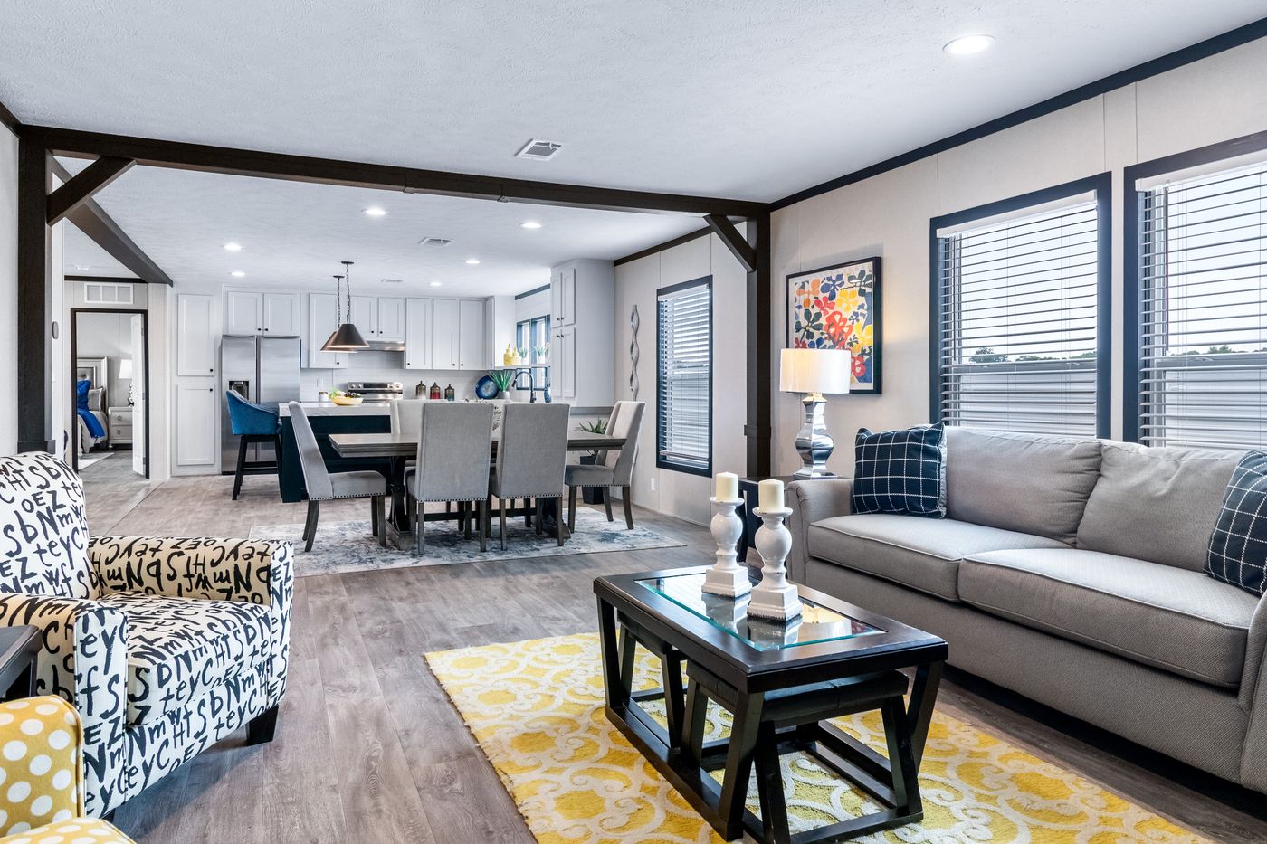 The HERCULES Den. This Manufactured Mobile Home features 4 bedrooms and 2 baths.