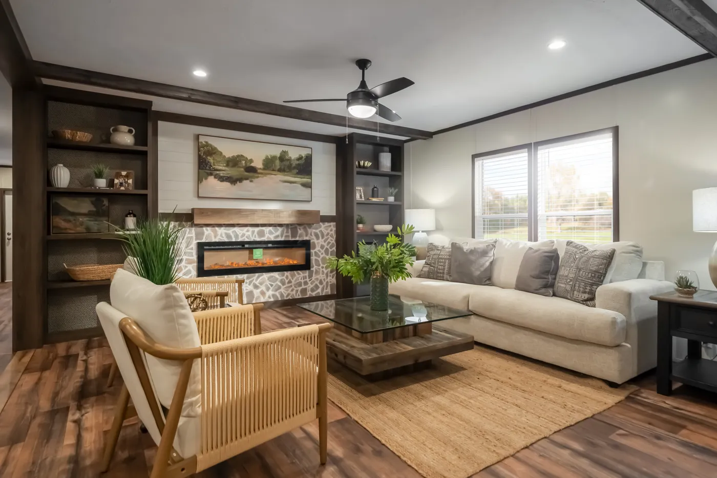 The MOUNTAIN VIEW Living Room. This Manufactured Mobile Home features 3 bedrooms and 2 baths.