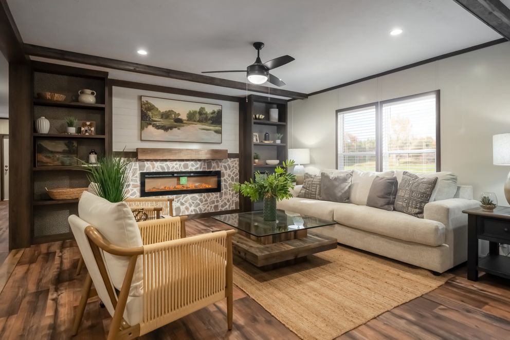 The MOUNTAIN VIEW Living Room. This Manufactured Mobile Home features 3 bedrooms and 2 baths.