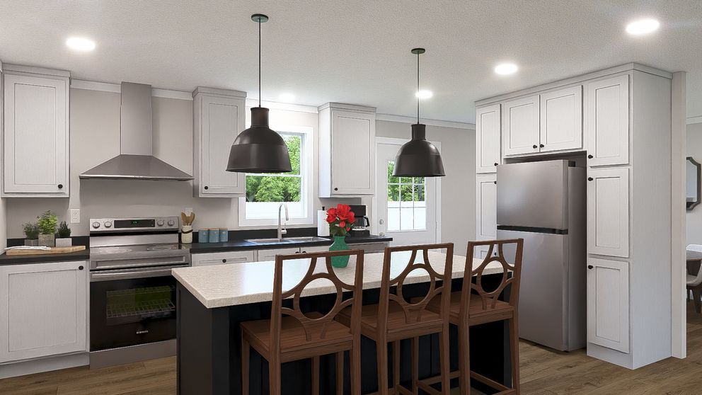 The BROWN EYED GIRL Kitchen. This Manufactured Mobile Home features 4 bedrooms and 2 baths.