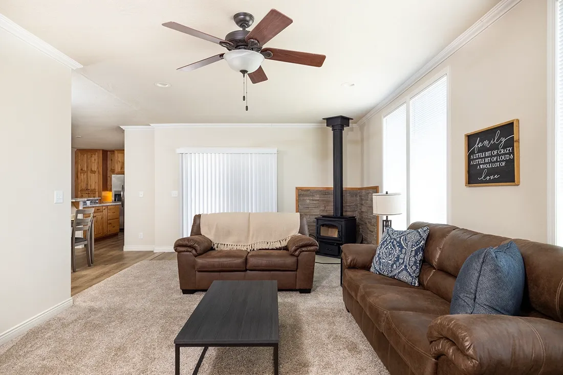The TH601F                 CLAYTON Living Room. This Manufactured Mobile Home features 3 bedrooms and 2 baths.