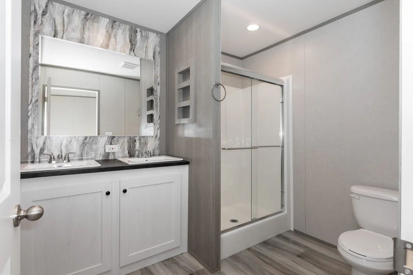 The THE PANTRY HOUSE Primary Bathroom. This Manufactured Mobile Home features 3 bedrooms and 2 baths.