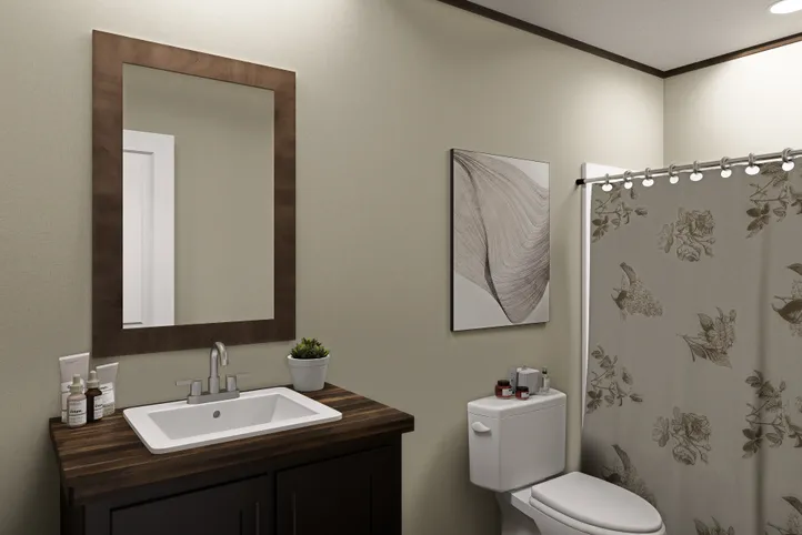 The EVEREST Guest Bathroom. This Manufactured Mobile Home features 4 bedrooms and 2 baths.