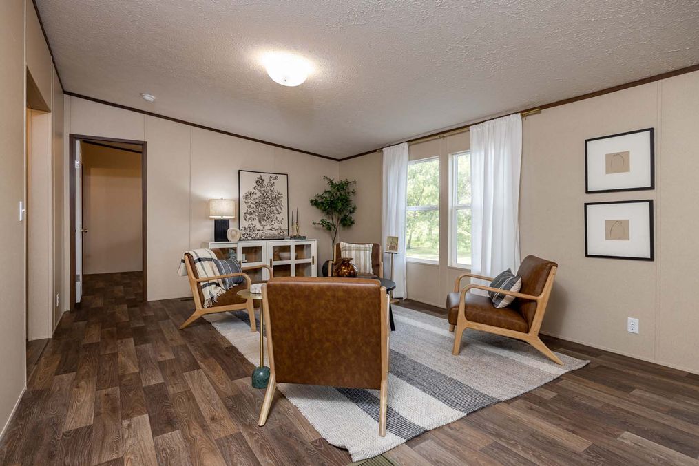 The PRIDE Dining Area. This Manufactured Mobile Home features 4 bedrooms and 2 baths.