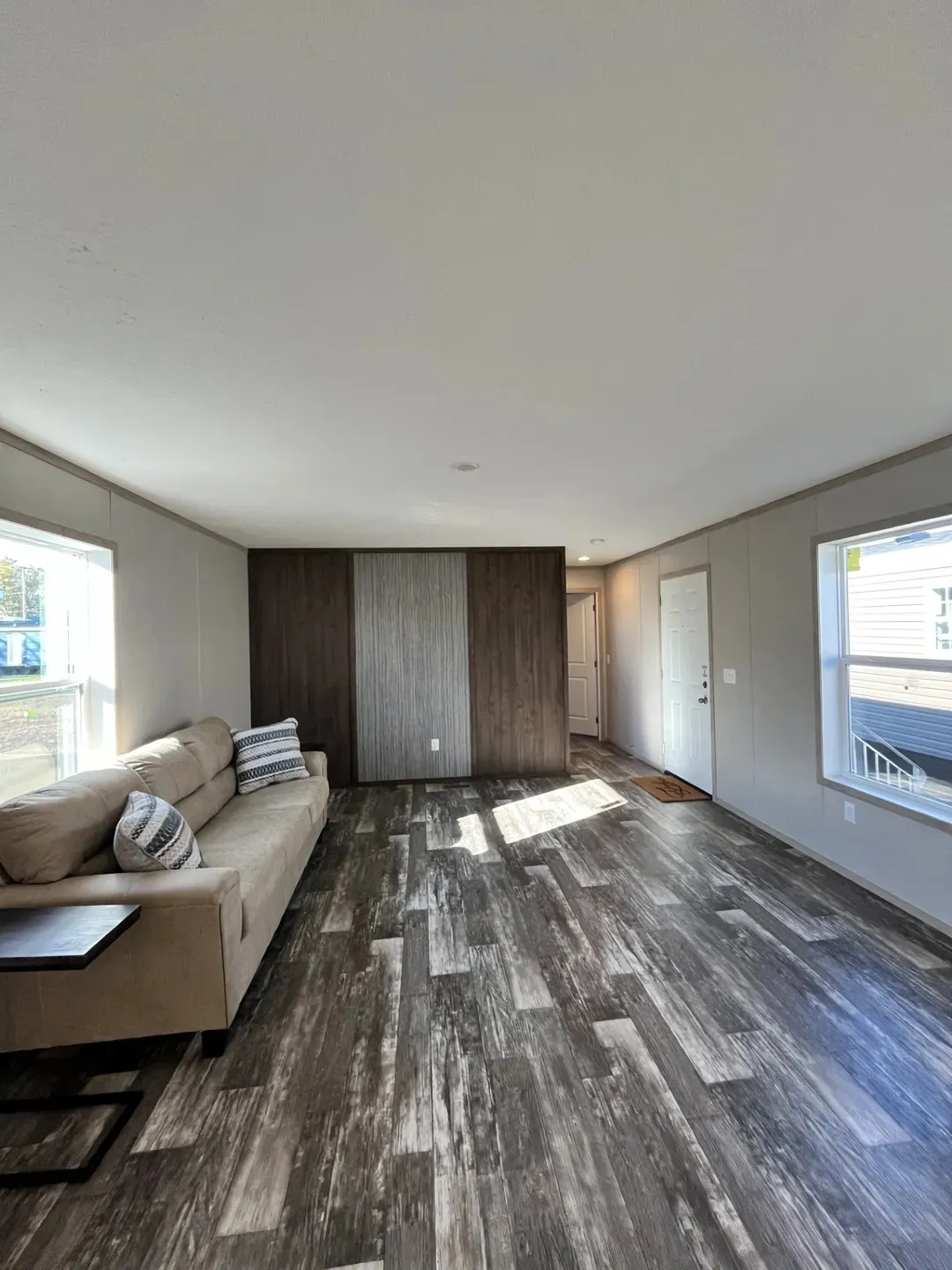 The SAPPHIRE Living Room. This Manufactured Mobile Home features 3 bedrooms and 2 baths.