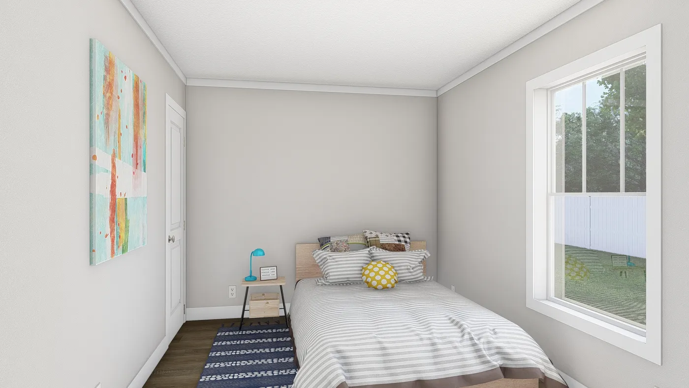 The MOVE ON UP Guest Bedroom. This Manufactured Mobile Home features 3 bedrooms and 2 baths.