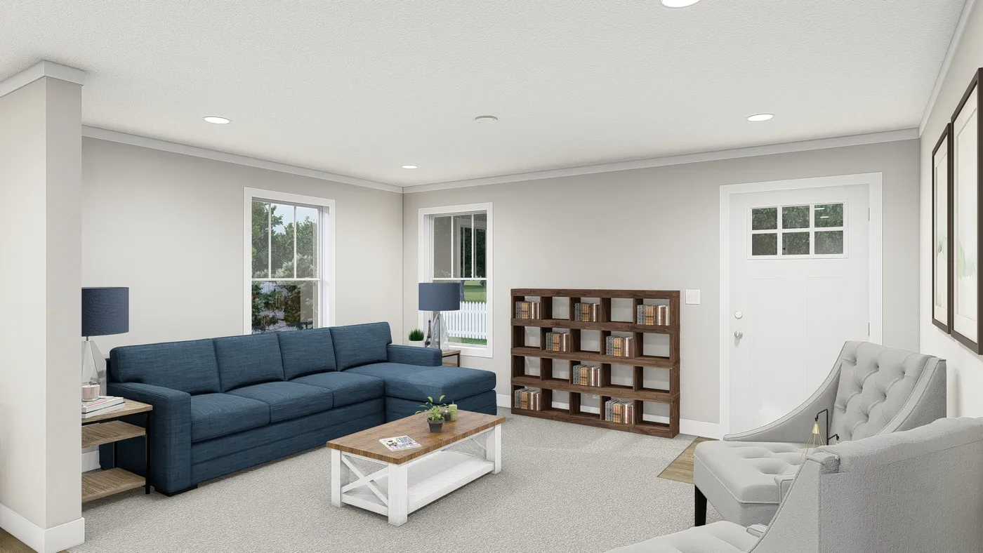 The UNDER PRESSURE Living Room. This Manufactured Mobile Home features 3 bedrooms and 2 baths.