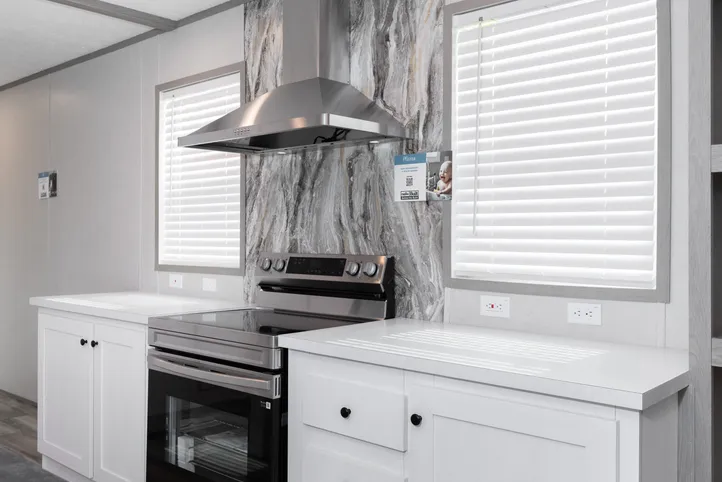 The PLATINUM ANNIVERSARY Kitchen. This Manufactured Mobile Home features 3 bedrooms and 2 baths.