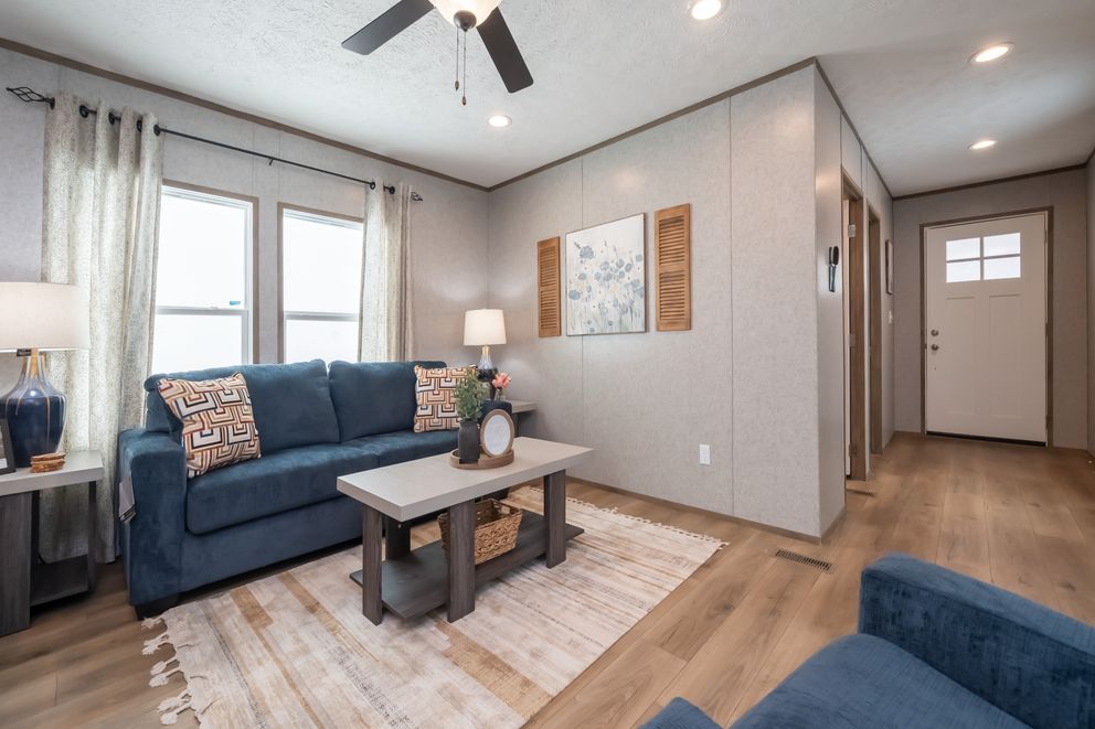 The WARRIOR II Living Room. This Manufactured Mobile Home features 2 bedrooms and 2 baths.