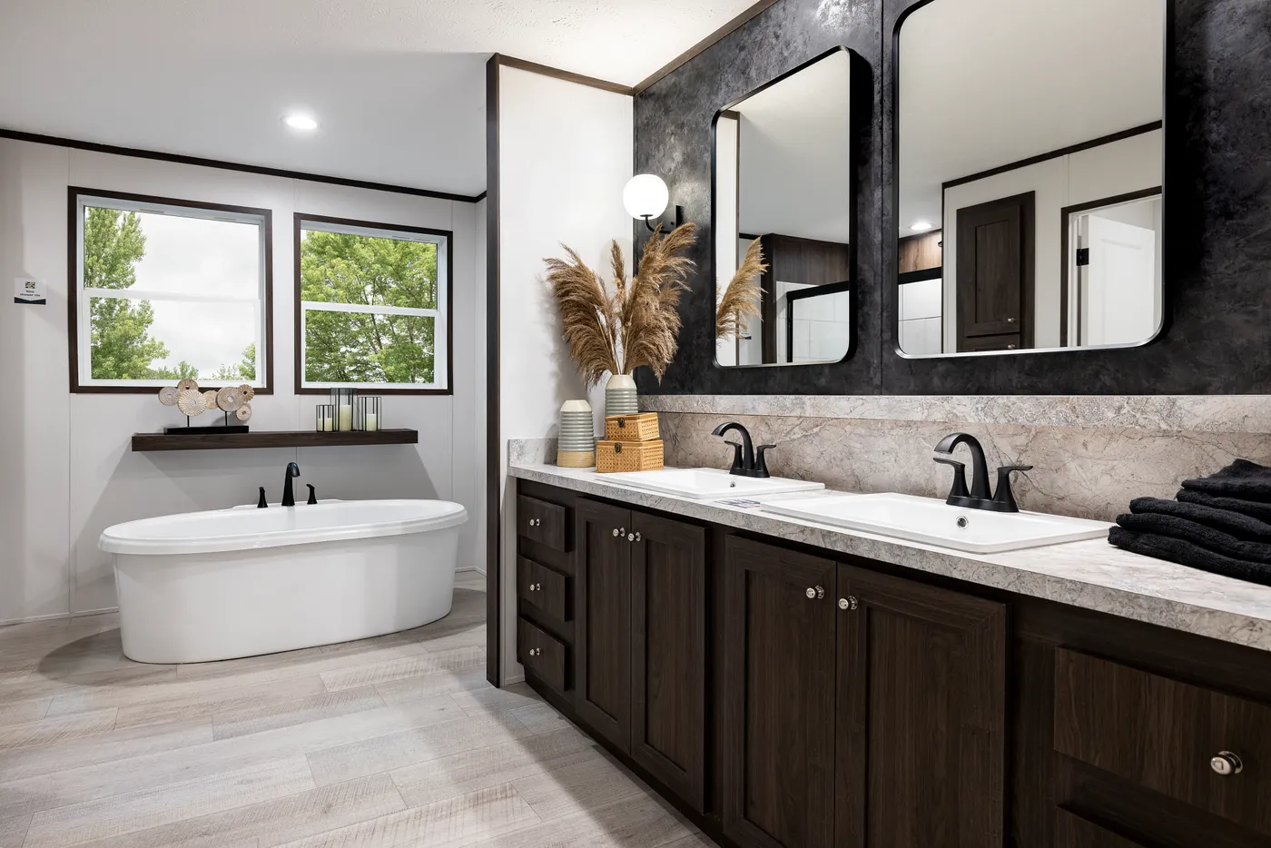 The CRESTWOOD Primary Bathroom. This Manufactured Mobile Home features 3 bedrooms and 2 baths.