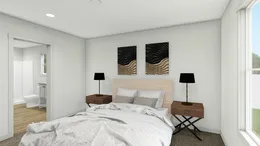 The UNDER PRESSURE Primary Bedroom. This Manufactured Mobile Home features 3 bedrooms and 2 baths.