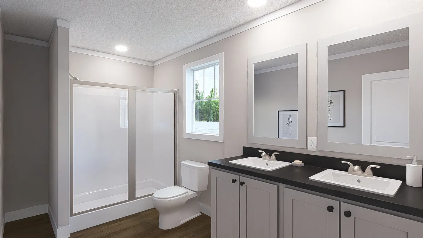 The UNDER PRESSURE Primary Bathroom. This Manufactured Mobile Home features 3 bedrooms and 2 baths.