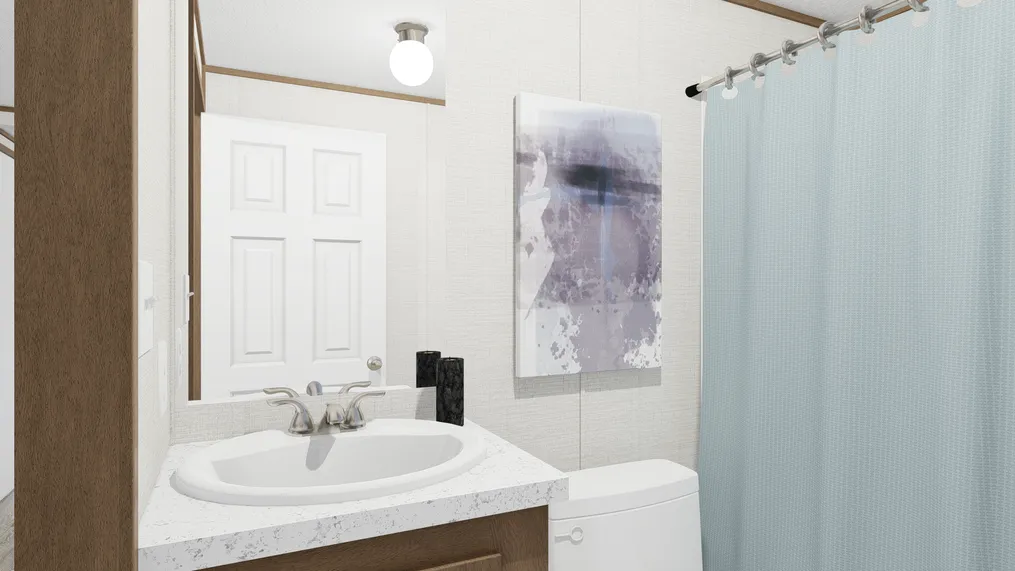 The GRAND Guest Bathroom. This Manufactured Mobile Home features 4 bedrooms and 2 baths.