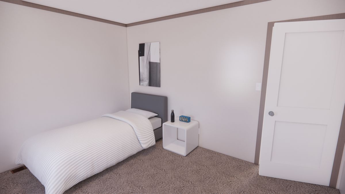 The 5228-E201 ADRENALINE Guest Bedroom. This Manufactured Mobile Home features 3 bedrooms and 2 baths.