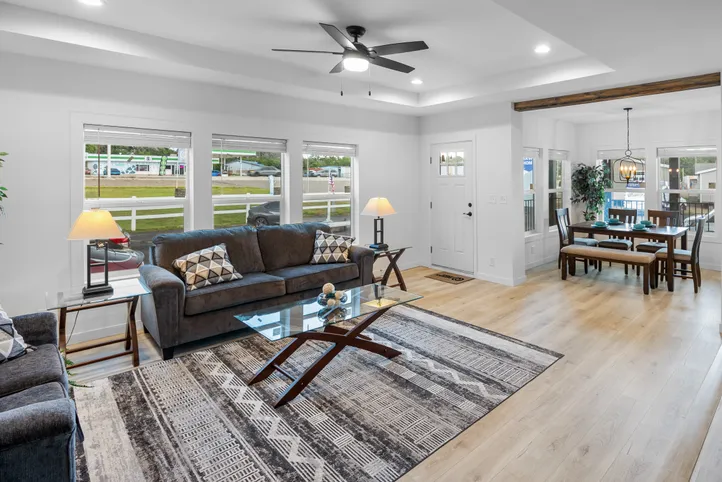 The LULAMAE 3 Living Room. This Manufactured Mobile Home features 3 bedrooms and 2 baths.