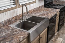 The NUMBER ONE Exterior. This Manufactured Mobile Home features 3 bedrooms and 2 baths.