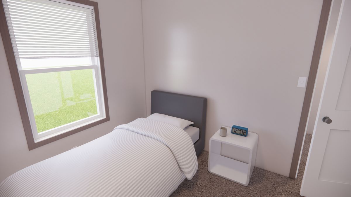 The 6616-4200 ADRENALINE Guest Bedroom. This Manufactured Mobile Home features 3 bedrooms and 2 baths.