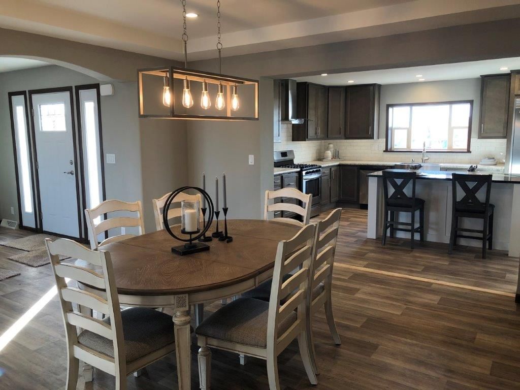 The LEGEND 572-1 MOD Dining Room. This Modular Home features 3 bedrooms and 2 baths.