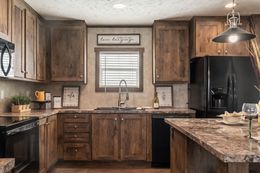 The ULTRA EXCEL 4 BR 28X68 Kitchen. This Manufactured Mobile Home features 4 bedrooms and 2 baths.
