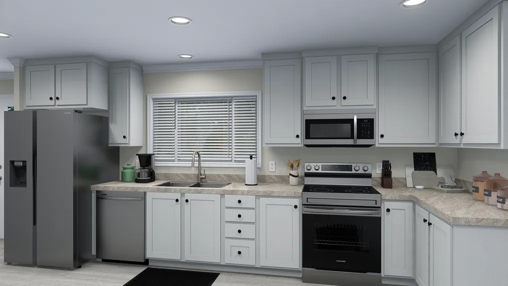 The 4207 "EMERALD" 7616 Kitchen. This Manufactured Mobile Home features 3 bedrooms and 2 baths.