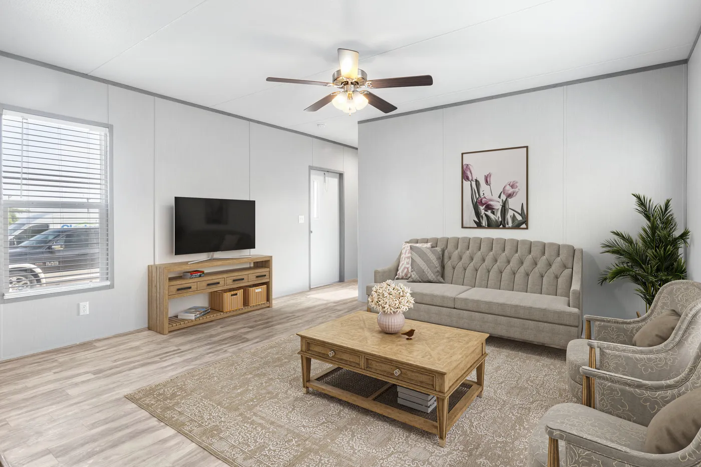 The BREEZE 16602A Living Room. This Manufactured Mobile Home features 2 bedrooms and 2 baths.