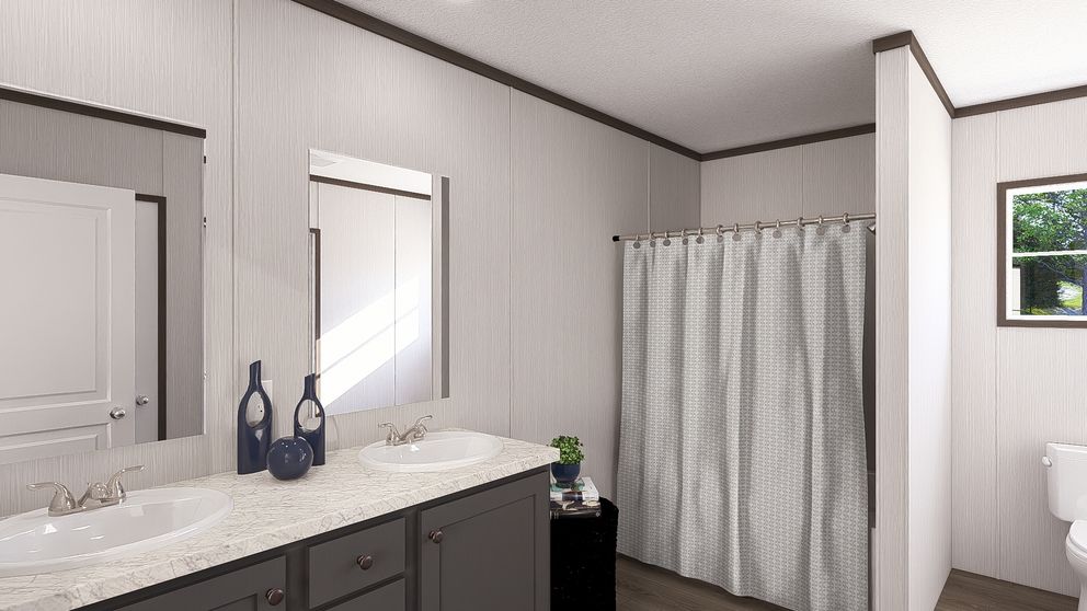 The LEGEND 28X68 Primary Bathroom. This Manufactured Mobile Home features 4 bedrooms and 2 baths.