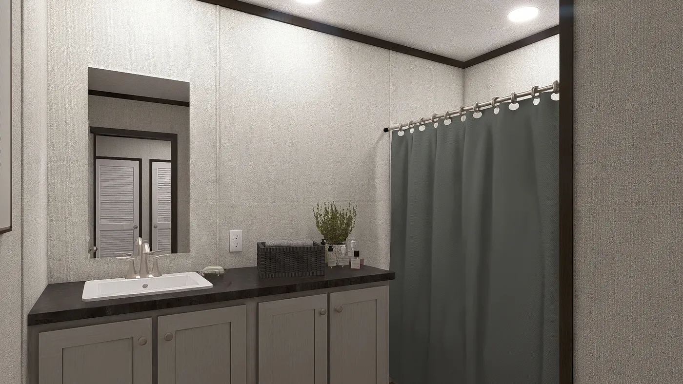 The IMPACT Guest Bathroom. This Manufactured Mobile Home features 4 bedrooms and 2 baths.