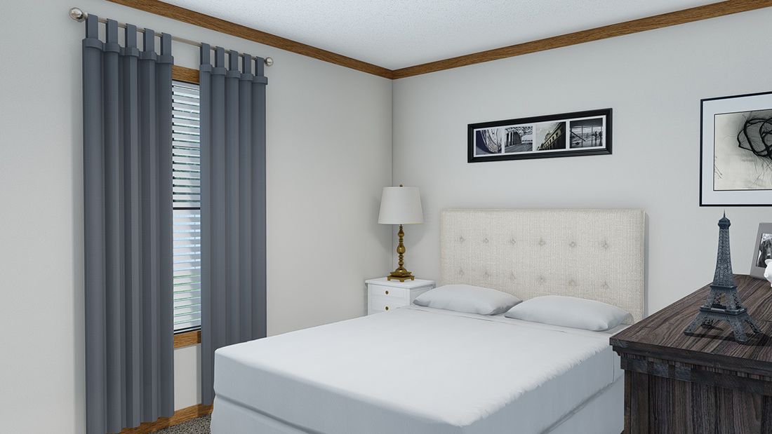 The LIZZIE Guest Bedroom. This Manufactured Mobile Home features 3 bedrooms and 2 baths.