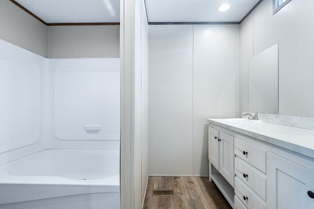 The SELECT 16723B Primary Bathroom. This Manufactured Mobile Home features 3 bedrooms and 2 baths.