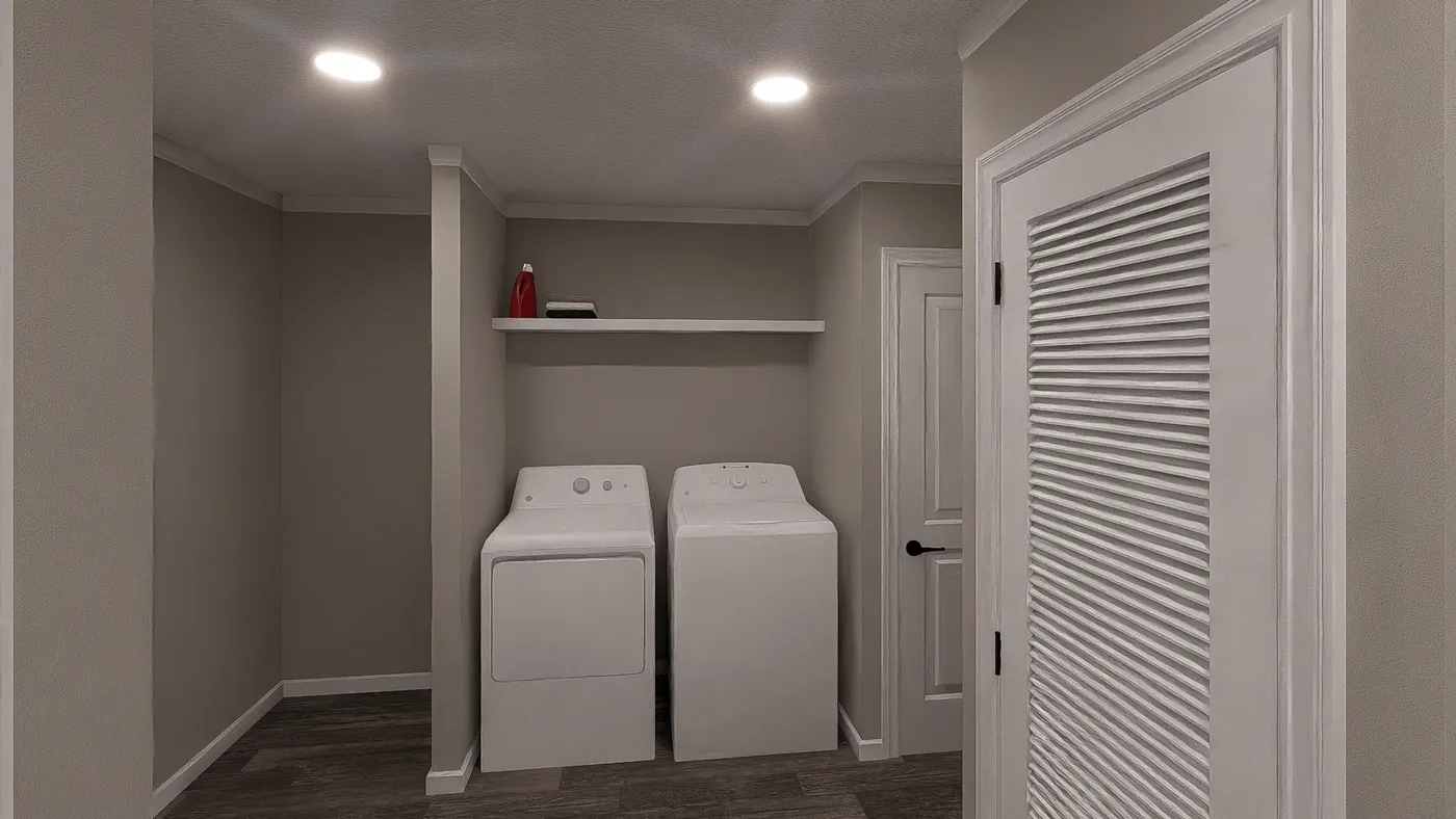 The THE LIL' EASY Utility Room. This Manufactured Mobile Home features 3 bedrooms and 2 baths.
