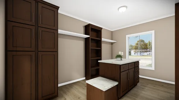 The THE BRYANT Primary Bedroom. This Manufactured Mobile Home features 4 bedrooms and 2 baths.