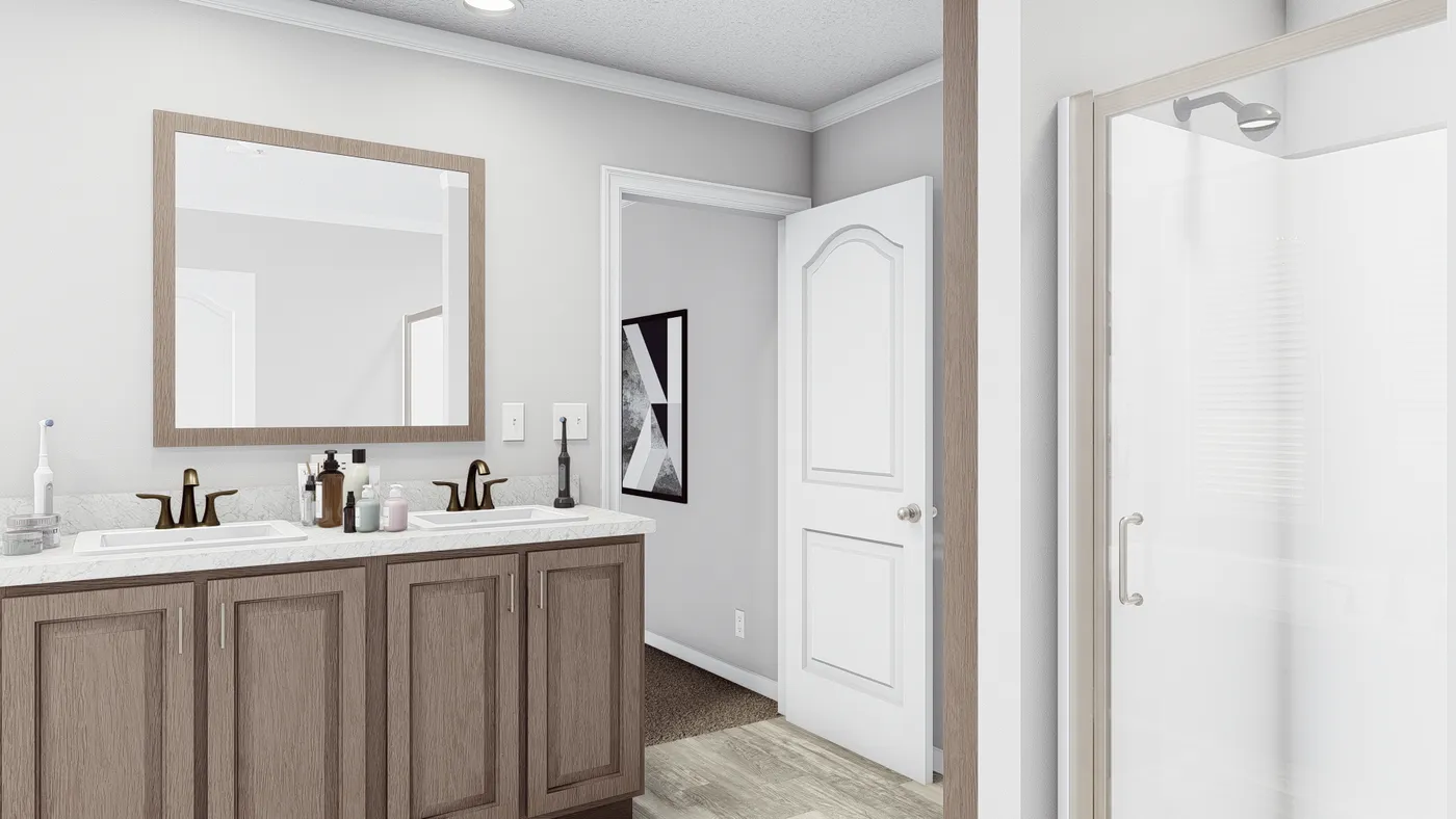 The THE SOUTHERN CHARM Primary Bathroom. This Manufactured Mobile Home features 3 bedrooms and 2 baths.