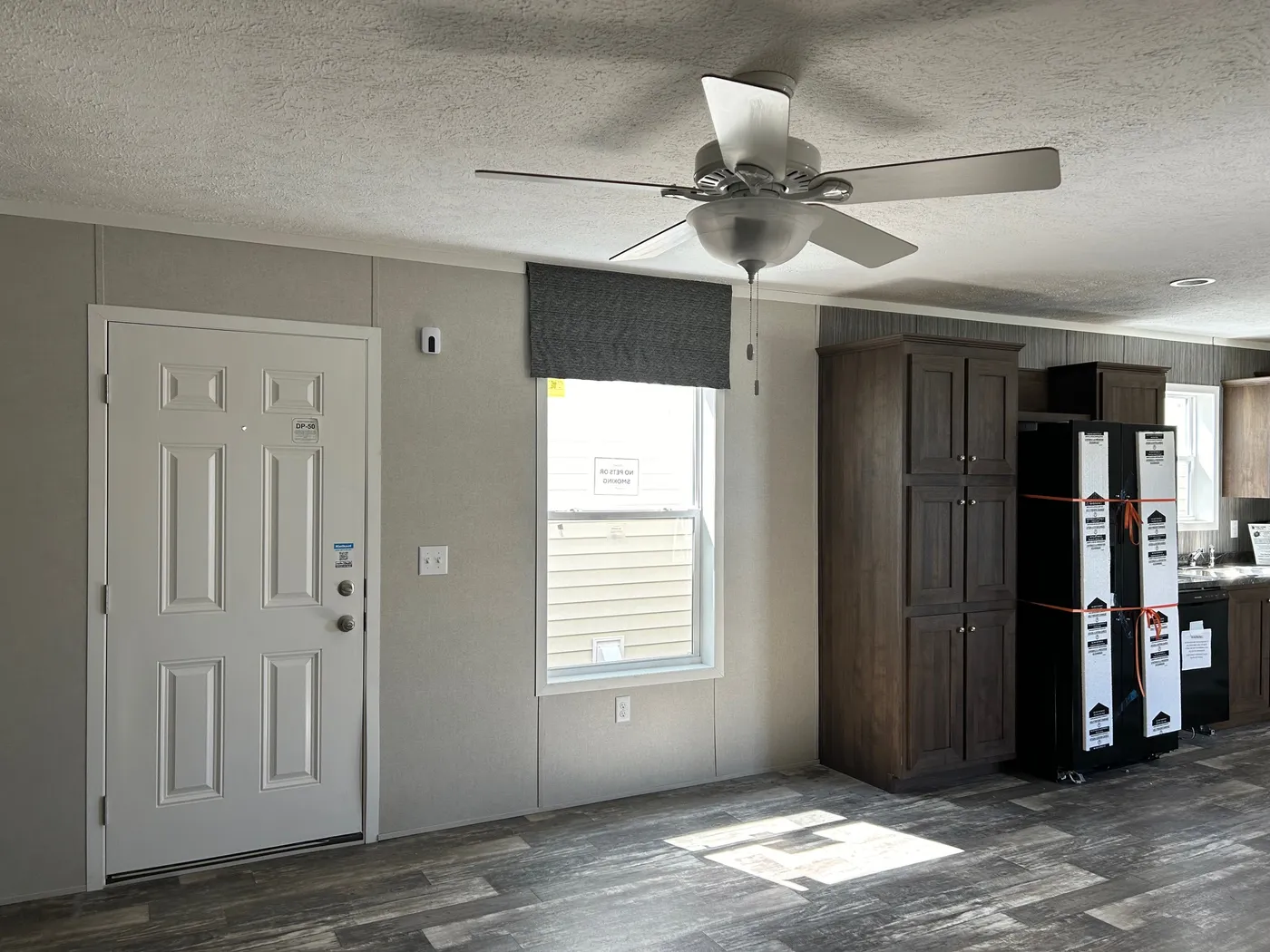 The SAPPHIRE XL 8016-644 Living Room. This Manufactured Mobile Home features 3 bedrooms and 2 baths.