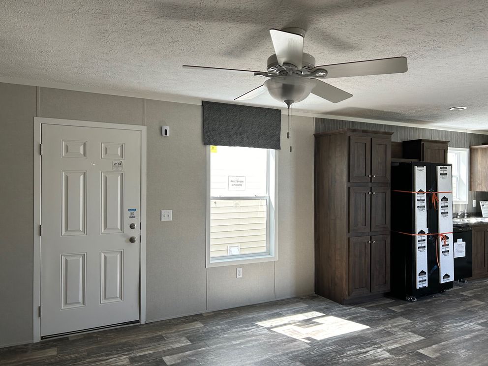 The SAPPHIRE XL 8016-644 Living Room. This Manufactured Mobile Home features 3 bedrooms and 2 baths.