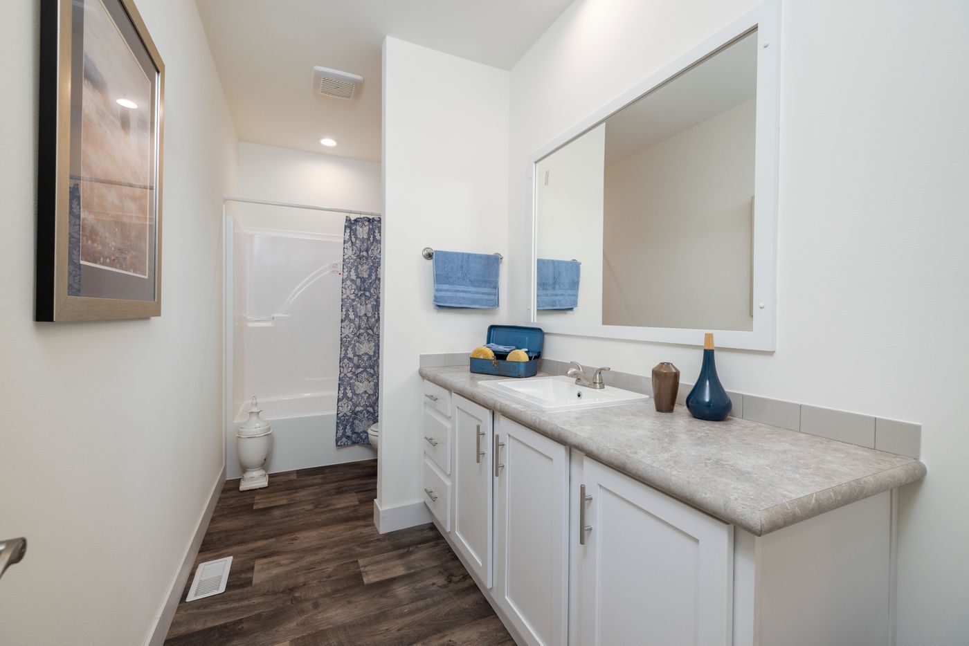 The 50TH ANNIVERSARY MOD Primary Bathroom. This Modular Home features 3 bedrooms and 2 baths.