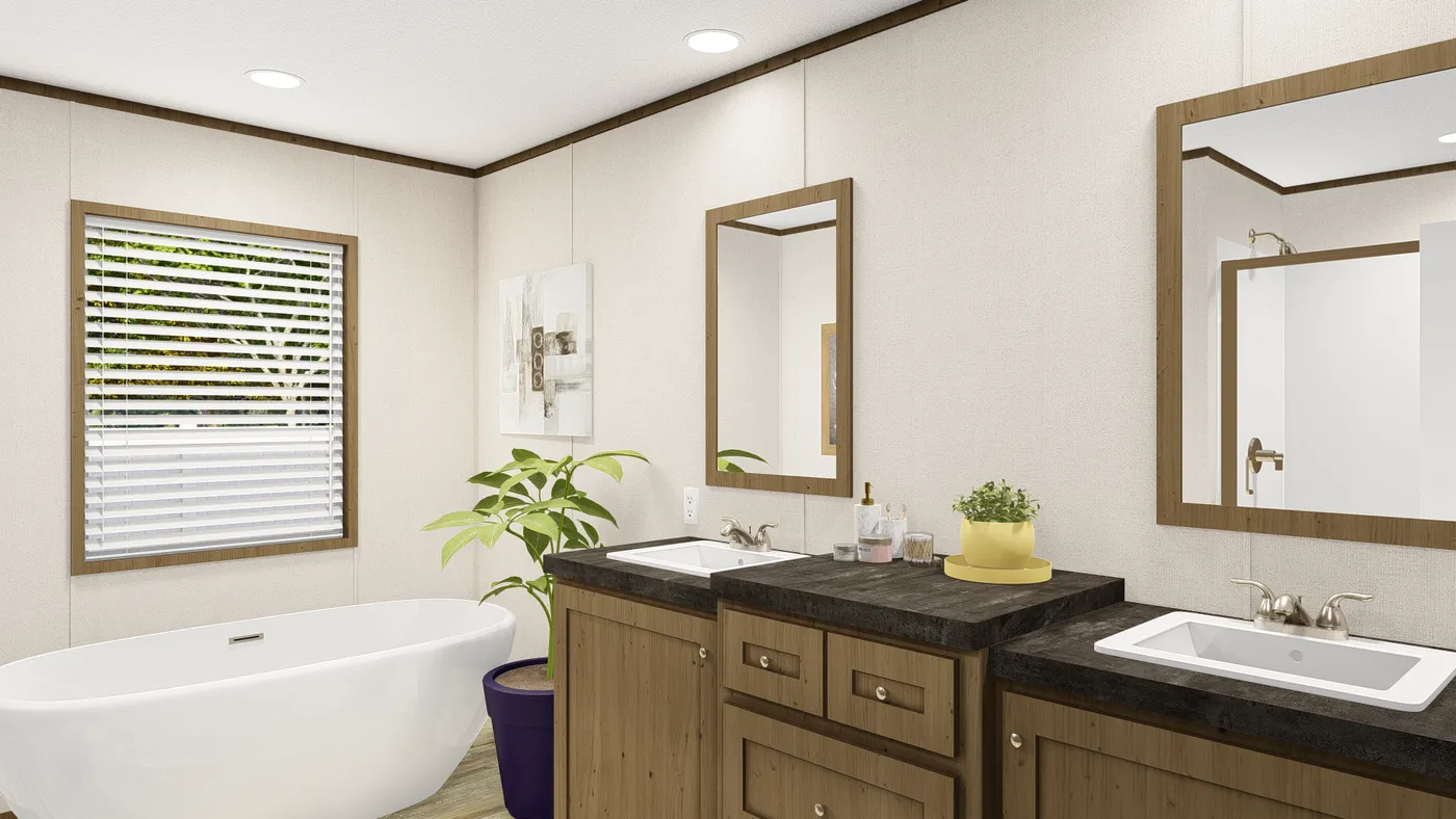 The GRAND LIVING 64 Primary Bathroom. This Manufactured Mobile Home features 3 bedrooms and 2 baths.