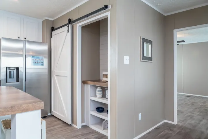 The ISLAND BREEZE Kitchen. This Manufactured Mobile Home features 3 bedrooms and 2 baths.