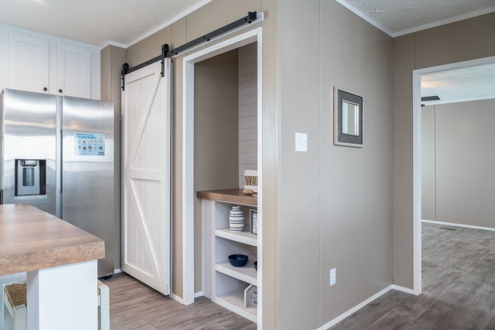 The ISLAND BREEZE Kitchen. This Manufactured Mobile Home features 3 bedrooms and 2 baths.