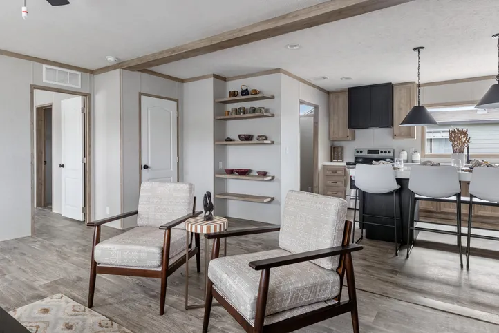 The STERLING XL ANNIVERSARY Living Room. This Manufactured Mobile Home features 3 bedrooms and 2 baths.
