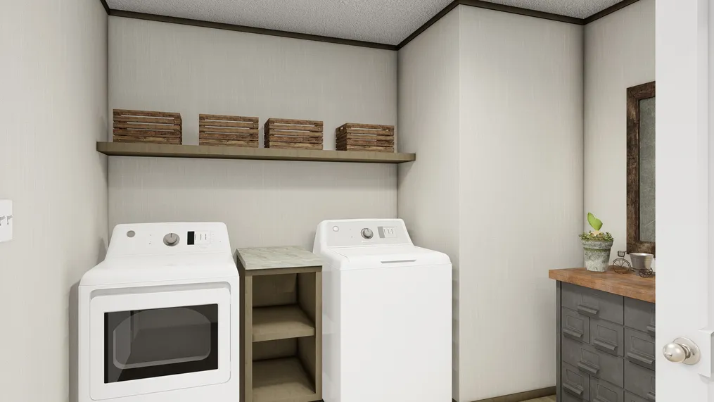 The EVEREST Utility Room. This Manufactured Mobile Home features 4 bedrooms and 2 baths.