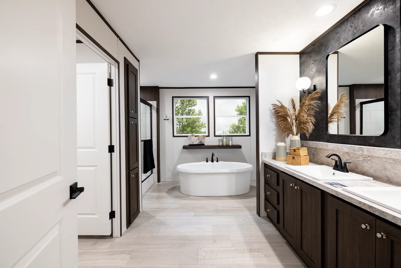 The CRESTWOOD Primary Bathroom. This Manufactured Mobile Home features 3 bedrooms and 2 baths.