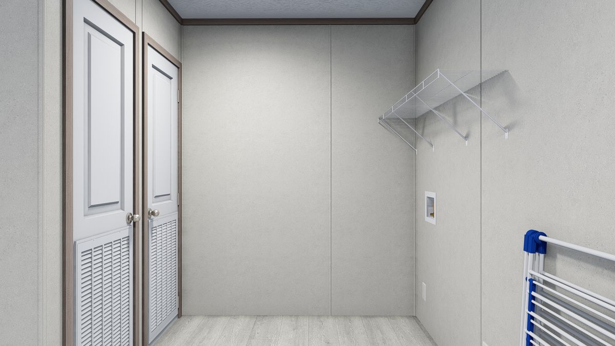 The 5228-5785 THE PULSE Utility Room. This Manufactured Mobile Home features 3 bedrooms and 2 baths.