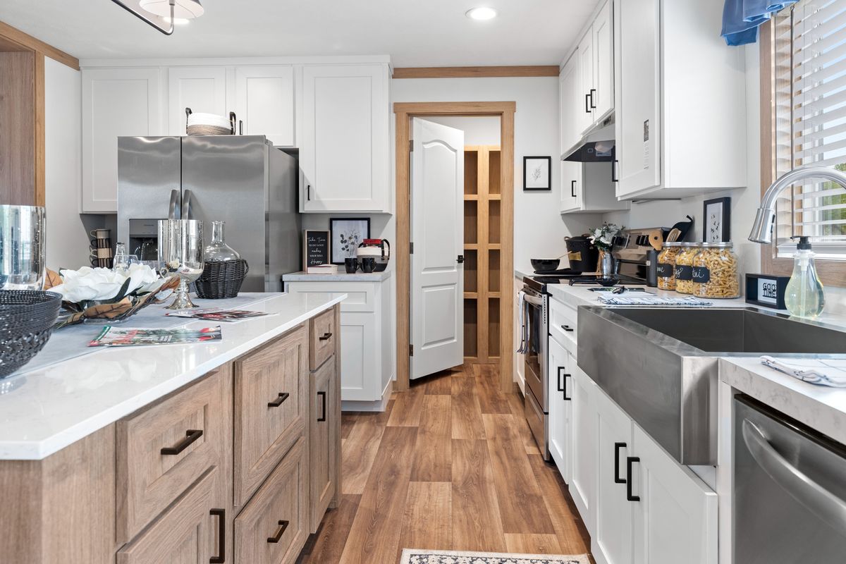 The THATCHER Kitchen. This Manufactured Mobile Home features 4 bedrooms and 2 baths.
