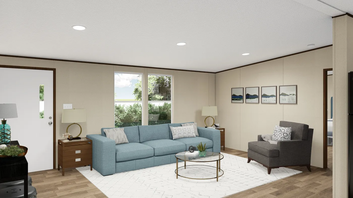 The MARVEL Living Room. This Manufactured Mobile Home features 4 bedrooms and 2 baths.