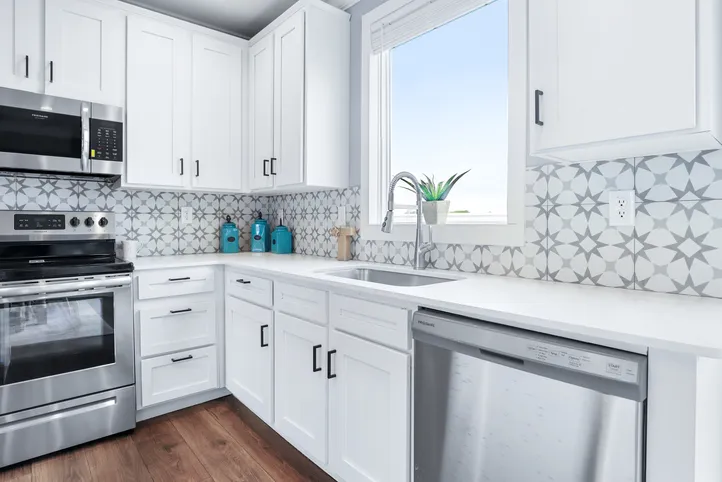 The THE ATLAS Kitchen. This Manufactured Mobile Home features 4 bedrooms and 3 baths.